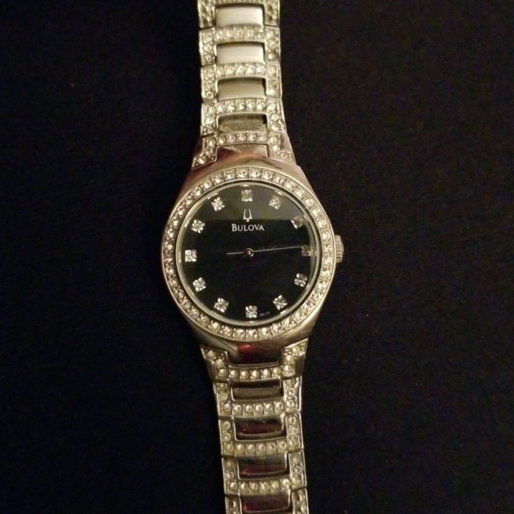 Bulova black face ladies watch